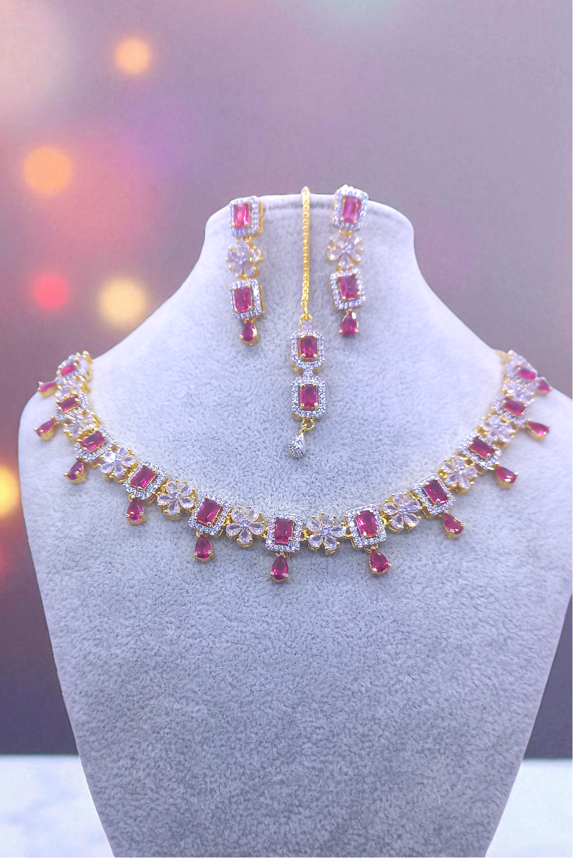 golden with redish pink stones