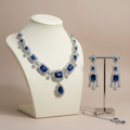 Blue sapphire jewelry set on display mannequin