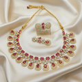 Ruby and gold jewelry set in elegant setting
